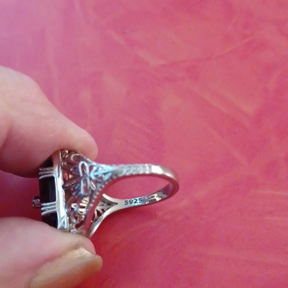 Silver ring marked s925 size 6 purple  stone